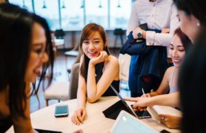 The Best Strategies to Attract More Women in Tech Positions women at work